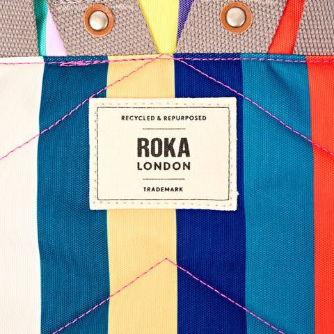 Roka Canfield B Small Wide Multi Stripe Recycled Canvas Roll-top Backpack